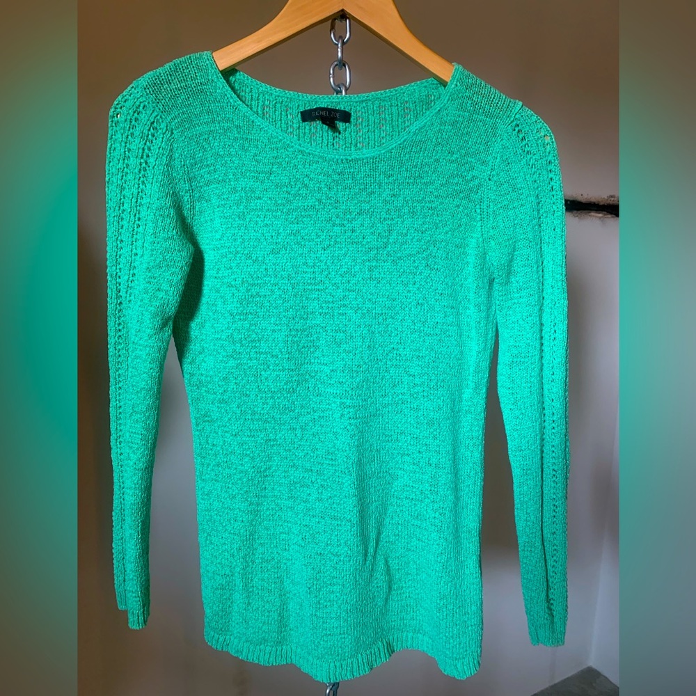 Women’s size small (polyester/cotton blend) knitted sweater.